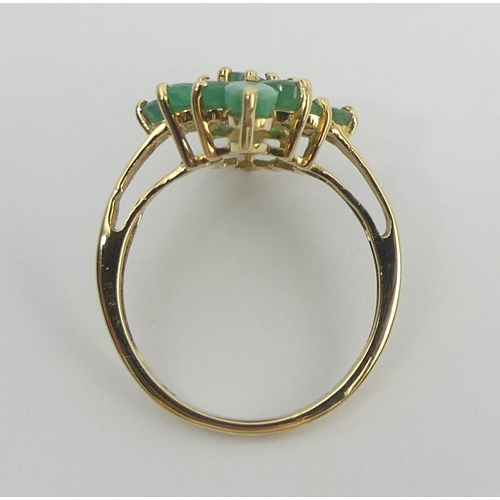 56 - 9ct gold emerald marquise form ring, 2.7 grams. Size N 1/2, 22.5 mm wide. UK Postage £12.