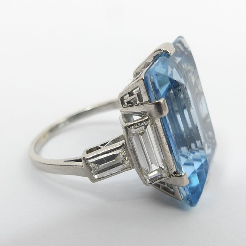 11 - Platinum (tested) aquamarine (approx. 11cts) and diamond ring, 6.5 grams. Size I, 18 mm. UK Postage ... 