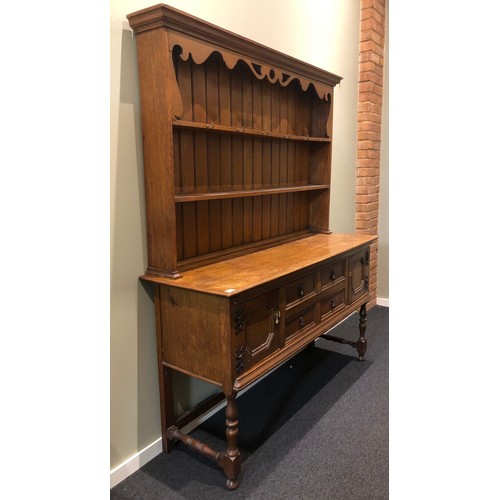 382 - 1920's oak Welsh dresser retailed by Jas Shoolbred. 158 wide x 51 deep x 192 cm high. Collection onl... 