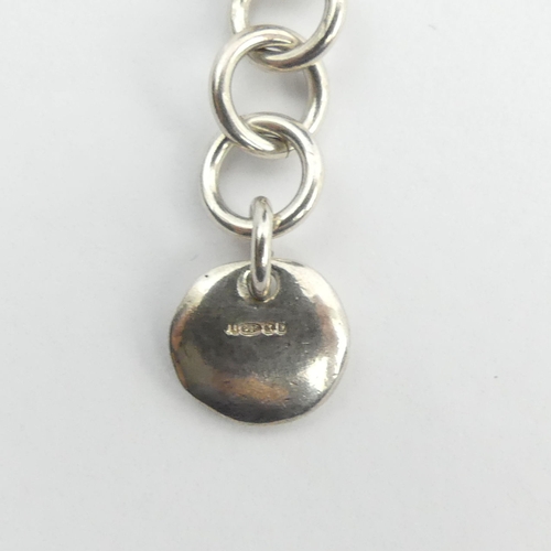 1 - Solid sterling silver tablet and ring design necklace, 45.6 grams. 39-43 cm x 8.5 mm. UK Postage £12... 