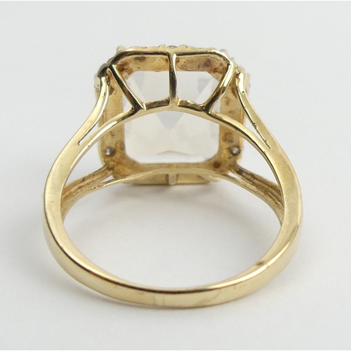 10 - 9ct gold white quartz and diamond ring, 3.4 grams. Size N 1/2, 15.5 mm. UK Postage £12.