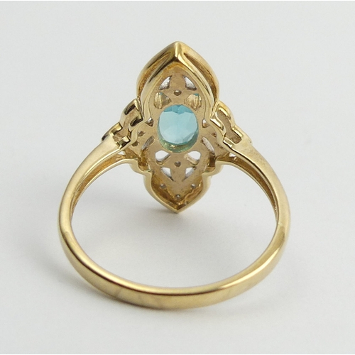 11 - 9ct gold topaz and diamond ring, 2.7 grams. Size N 1/2, 19.7 mm. UK Postage £12.