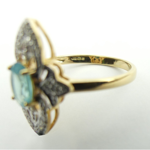 11 - 9ct gold topaz and diamond ring, 2.7 grams. Size N 1/2, 19.7 mm. UK Postage £12.