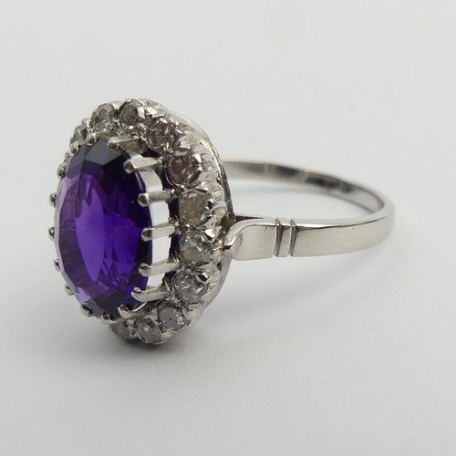 19 - 850 Platinum amethyst and diamond cluster ring, 9 grams. Size U, 17.1 mm. UK Postage £12.