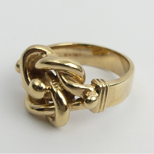 22 - 9ct gold knot ring, 15.7 grams. Size Y, 17 mm. UK Postage £12.