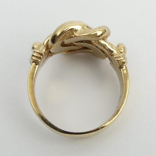 22 - 9ct gold knot ring, 15.7 grams. Size Y, 17 mm. UK Postage £12.