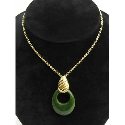 4 - New Zealand jade pendant with 12ct gf chain and mount, 16.3 grams. Pendant 47 mm. UK Postage £12.