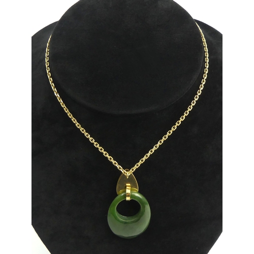 4 - New Zealand jade pendant with 12ct gf chain and mount, 16.3 grams. Pendant 47 mm. UK Postage £12.