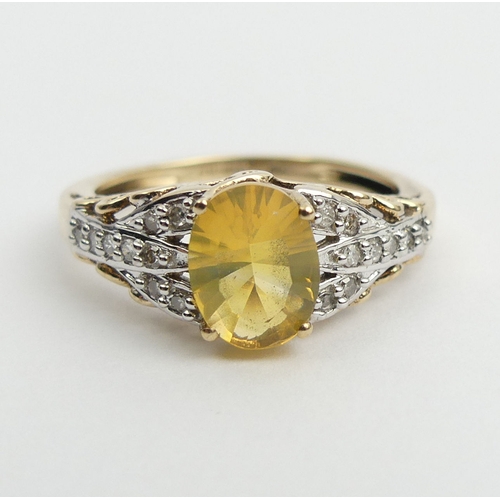 5 - 9ct gold fire opal and diamond ring, 2.7 grams. Size N, 8.2 grams. UK Postage £12.