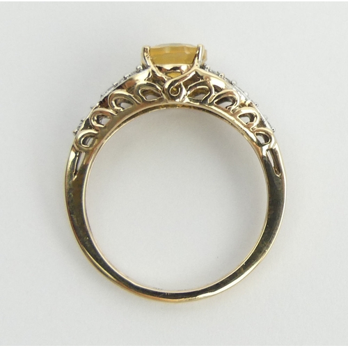 5 - 9ct gold fire opal and diamond ring, 2.7 grams. Size N, 8.2 grams. UK Postage £12.