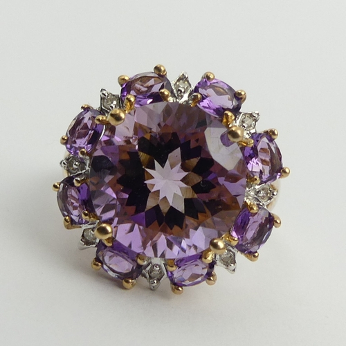 6 - 9ct gold amethyst and diamond cluster ring, 4.8 grams. Size N 1/2, 18.2 mm. UK Postage £12.