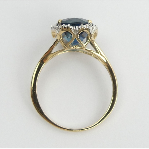 8 - 9ct gold blue topaz ring, 2.9 grams. Size N 1/2, 11 mm. UK Postage £12.