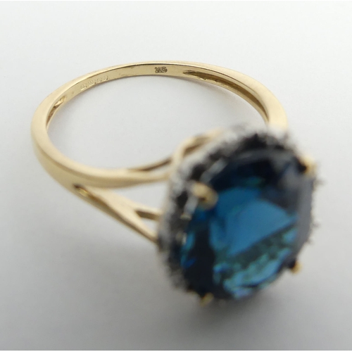 8 - 9ct gold blue topaz ring, 2.9 grams. Size N 1/2, 11 mm. UK Postage £12.