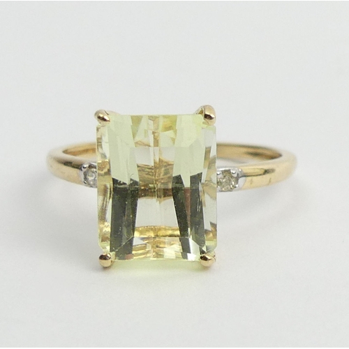 9 - 9ct gold canary kunzite and diamond ring, 2.1 grams. Size N 1/2, 11 mm. UK Postage £12.