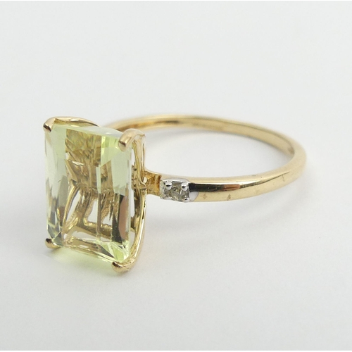 9 - 9ct gold canary kunzite and diamond ring, 2.1 grams. Size N 1/2, 11 mm. UK Postage £12.