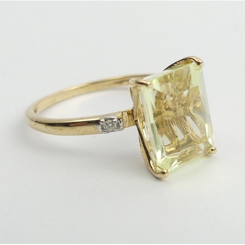 9 - 9ct gold canary kunzite and diamond ring, 2.1 grams. Size N 1/2, 11 mm. UK Postage £12.