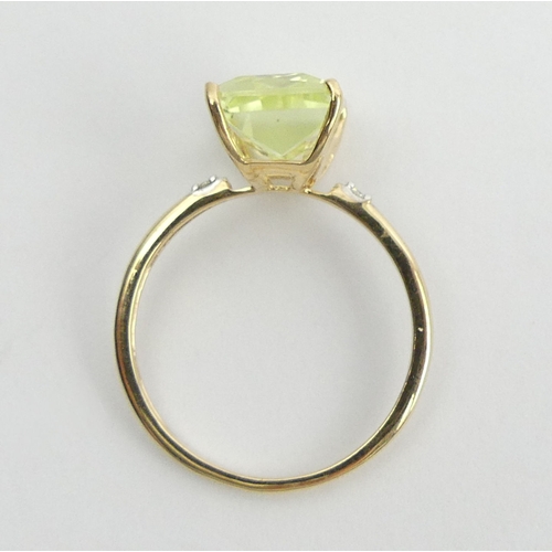 9 - 9ct gold canary kunzite and diamond ring, 2.1 grams. Size N 1/2, 11 mm. UK Postage £12.