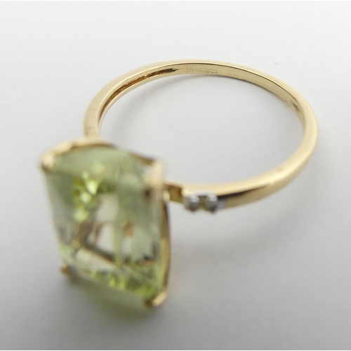 9 - 9ct gold canary kunzite and diamond ring, 2.1 grams. Size N 1/2, 11 mm. UK Postage £12.