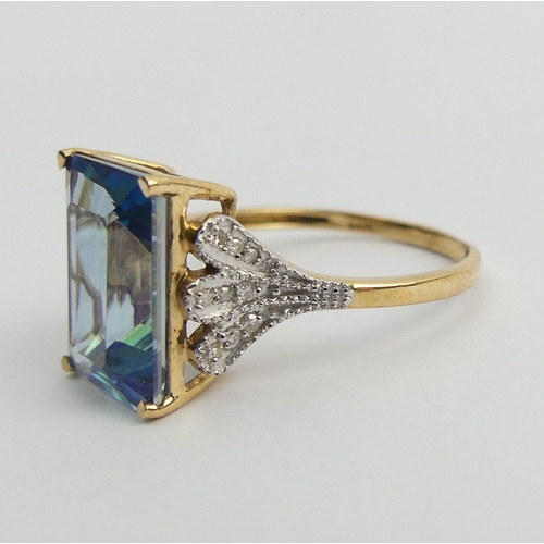 30 - 9ct gold mystic topaz and diamond ring, 4.2 grams. Size R 1/2, 14.3 mm. UK Postage £12.