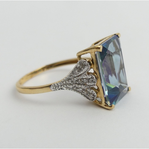 30 - 9ct gold mystic topaz and diamond ring, 4.2 grams. Size R 1/2, 14.3 mm. UK Postage £12.