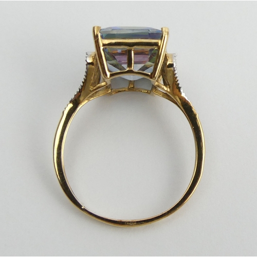 30 - 9ct gold mystic topaz and diamond ring, 4.2 grams. Size R 1/2, 14.3 mm. UK Postage £12.