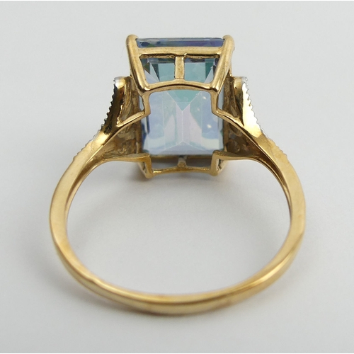 30 - 9ct gold mystic topaz and diamond ring, 4.2 grams. Size R 1/2, 14.3 mm. UK Postage £12.