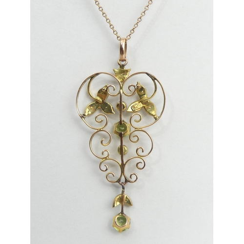 30A - 9ct gold peridot and seed pearl pendant and chain, 3 grams. Chain 42 cm, pendant 4.8 cm. UK Postage ... 