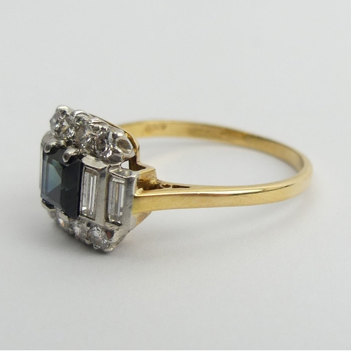 33 - 18ct gold sapphire and diamond ring, 4.6 grams. Size U, 11.4 mm wide. UK Postage £12.