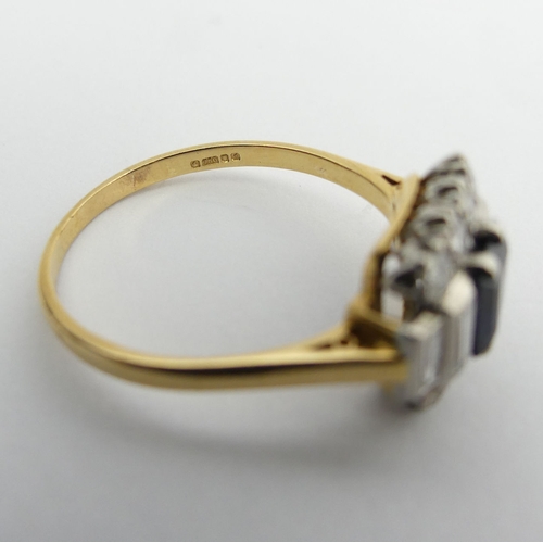 33 - 18ct gold sapphire and diamond ring, 4.6 grams. Size U, 11.4 mm wide. UK Postage £12.