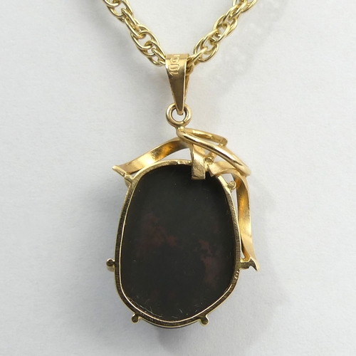 36 - 9ct gold opal doublet pendant and chain, 9.9 grams. Pendant 28 mm, chain 54 cm. UK Postage £12.