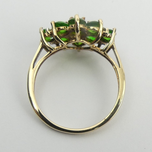 37 - 9ct gold chrome diopside ring, 2.4 grams. Size N, 12.3 mm wide. UK Postage £12.