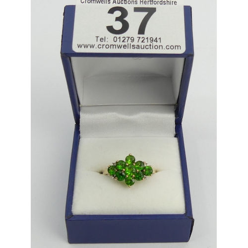 37 - 9ct gold chrome diopside ring, 2.4 grams. Size N, 12.3 mm wide. UK Postage £12.