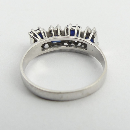 40A - 18ct white gold sapphire and diamond ring, 2.9 grams. Size N, 5.9 mm. UK Postage £12.