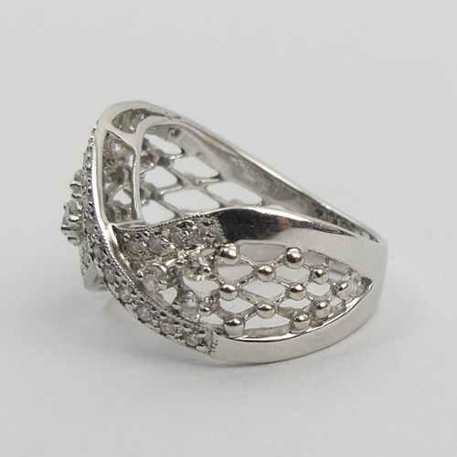 50A - Stylish design 18ct white gold diamond ring, 5.9 grams. Size N, 14.2 mm. UK Postage £12.