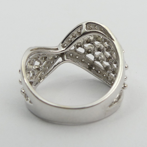 50A - Stylish design 18ct white gold diamond ring, 5.9 grams. Size N, 14.2 mm. UK Postage £12.