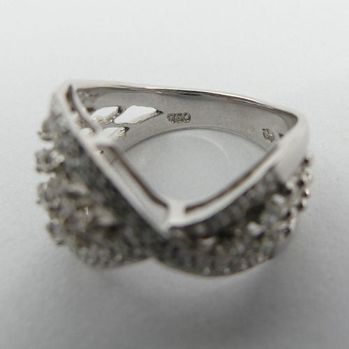 50A - Stylish design 18ct white gold diamond ring, 5.9 grams. Size N, 14.2 mm. UK Postage £12.