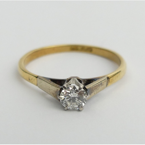 55 - 18ct gold and platinum diamond (approx .25ct) single stone ring, 1.9 grams. Size O, 4.5 mm wide. UK ... 