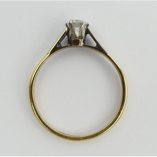 55 - 18ct gold and platinum diamond (approx .25ct) single stone ring, 1.9 grams. Size O, 4.5 mm wide. UK ... 