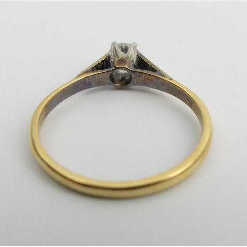 55 - 18ct gold and platinum diamond (approx .25ct) single stone ring, 1.9 grams. Size O, 4.5 mm wide. UK ... 