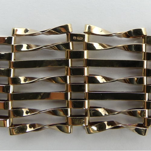 57 - 9ct gold seven bar gate bracelet, 13.7 grams. 18 cm x 22 mm. UK Postage £12.