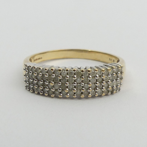 70A - 9ct gold diamond four row ring, 4.8 grams. Size Z + 2.5, 6.7 mm. UK Postage £12.