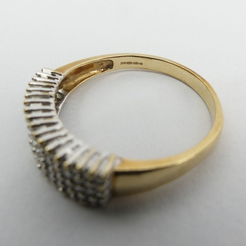 70A - 9ct gold diamond four row ring, 4.8 grams. Size Z + 2.5, 6.7 mm. UK Postage £12.