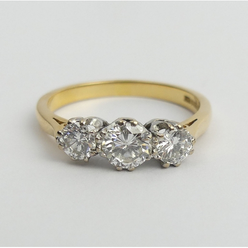 71 - 18ct gold three stone diamond ring (1.4 stamped inside). Size U, 6.2 mm. UK Postage £12.