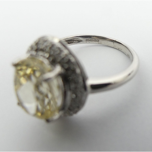 76 - 9ct white gold yellow kunzite & diamond ring, 3.9 grams. Size M 1/2, 15.2 mm. UK Postage £12.