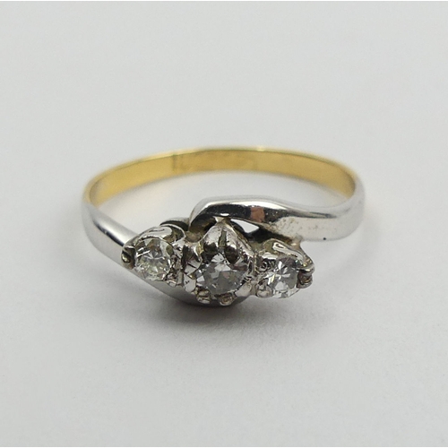 80A - 18ct gold and platinum diamond three stone ring, 2.1 grams. Size L, 6 mm wide. UK Postage £12.