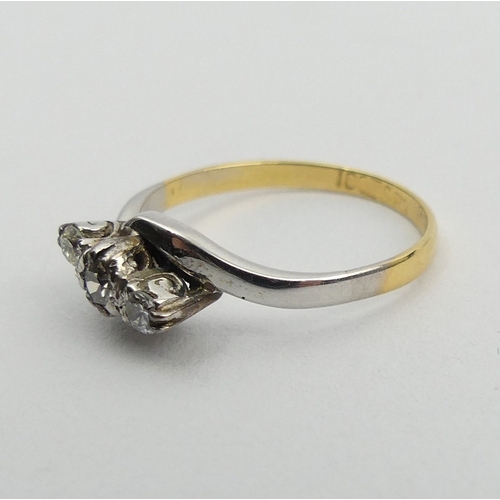 80A - 18ct gold and platinum diamond three stone ring, 2.1 grams. Size L, 6 mm wide. UK Postage £12.