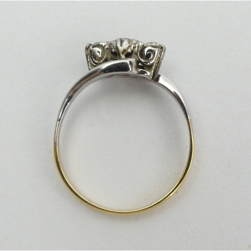 80A - 18ct gold and platinum diamond three stone ring, 2.1 grams. Size L, 6 mm wide. UK Postage £12.