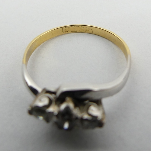 80A - 18ct gold and platinum diamond three stone ring, 2.1 grams. Size L, 6 mm wide. UK Postage £12.