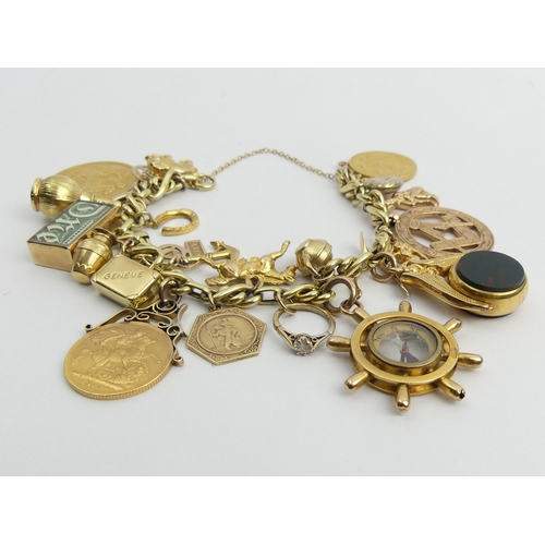 86 - 14ct gold charm bracelet with an 1887 two pound piece and two 1913 sovereigns, along with a compass ... 