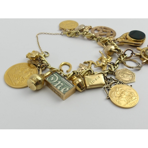 86 - 14ct gold charm bracelet with an 1887 two pound piece and two 1913 sovereigns, along with a compass ... 